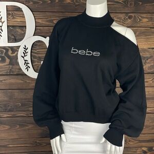 Bebe One Shoulder Cut Out‎ Black Ribbed Knit Sweater  Rhinestone Bedazzled Logo